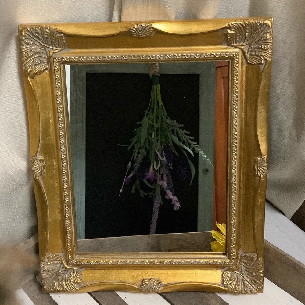 Ornate Gold Wall Mirror with Decorative Frame